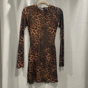 Leopard print, open back dress from White Fox Boutique. Size Small.
